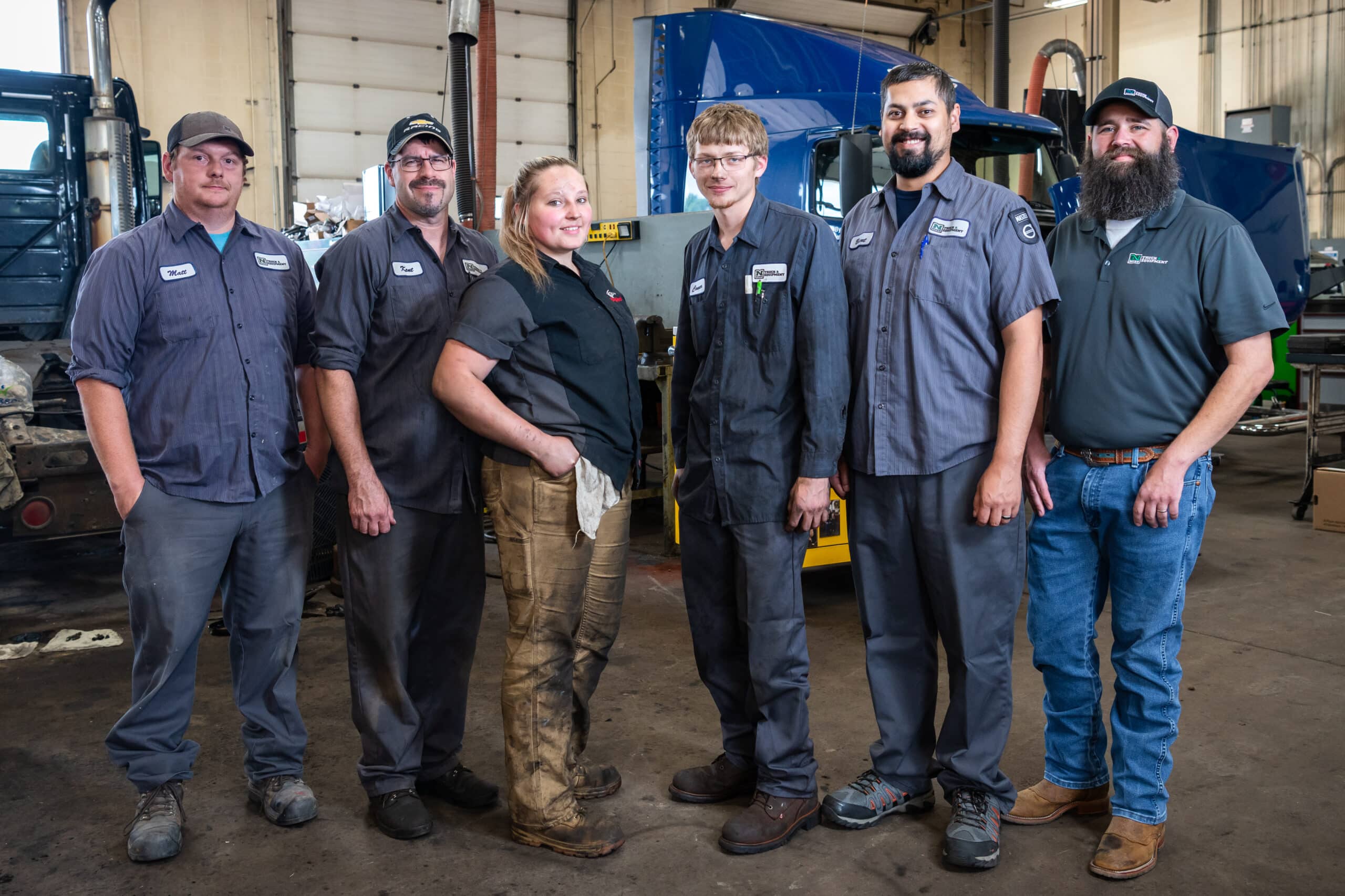 Nuss Truck & Equipment team members in the shop