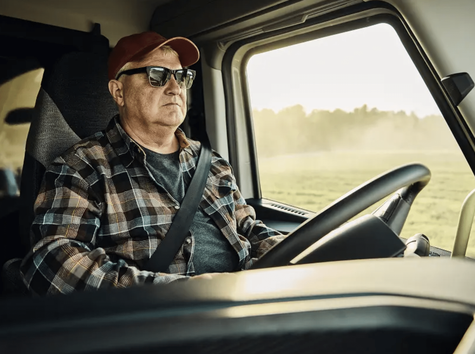 Driver's hands on the Volvo VNX steering wheel